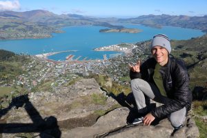 Here’s me giving the ol’ Hook’em Horns in the mountains above Lyttelton Harbour, see ya soon!