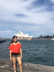 Alondra poses with the Sydney opera house in the background