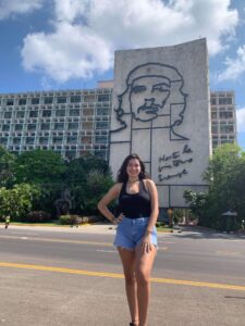 Standing in front of the Plaza de la Revolución in Cuba.