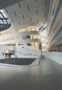 interior of building with modern white architecture and skylights