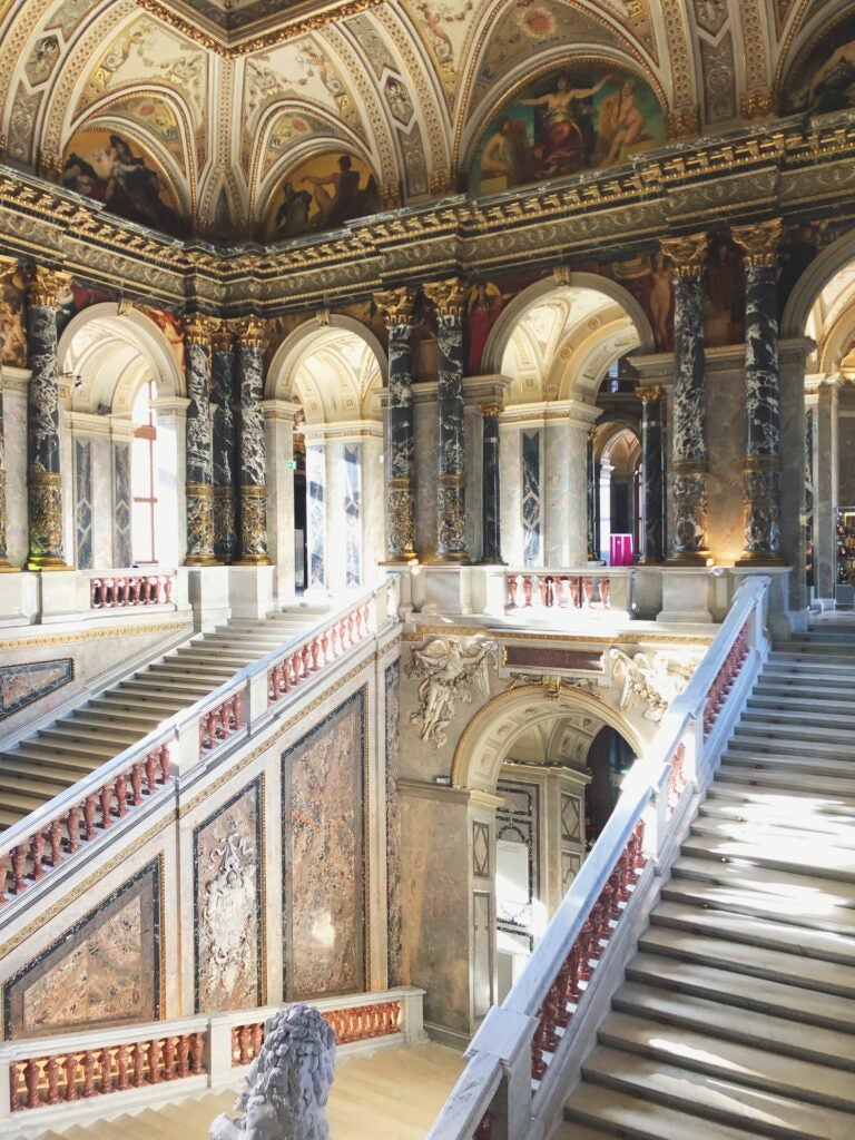 historical building with two large staircases during daytime
