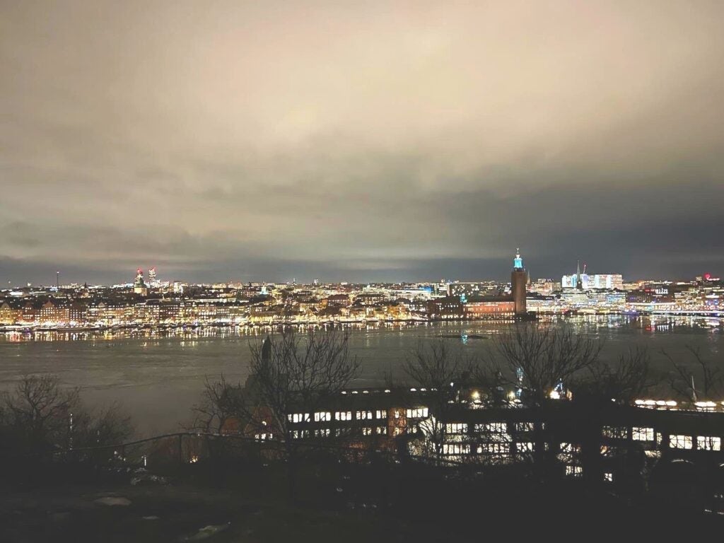 A view of Stockholm across the water at night