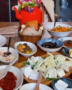 An arrangement of Turkish breakfast dishes on a table