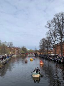 A photo of rafts drifting down a river