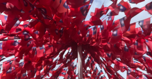 A sea of red flags is taken from the bottom up.