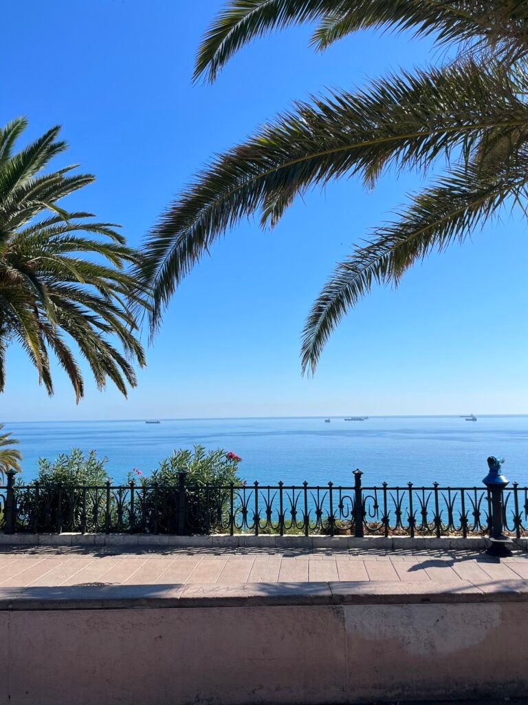 An observation area overlooking the sea, port, beach and the Roman amphitheater.
