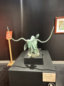 A sculpture of Bevo on display at an art museum.