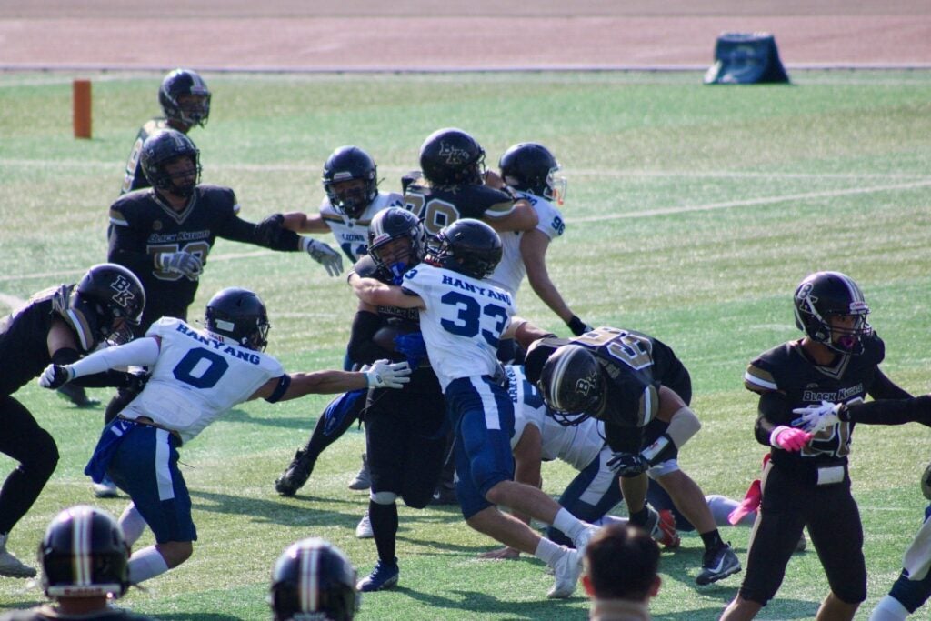 Hanyang University American Football Team in Seoul faces off against a rival team