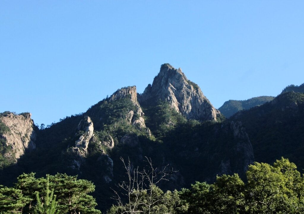 Looking up at some of the tall mountain spires in the Seokran Mountain range